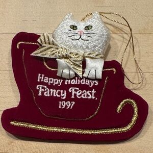 Vintage 1997 Happy Holidays Fancy Feast Cat Christmas Ornament.